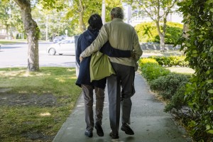 Elderly couple walking together