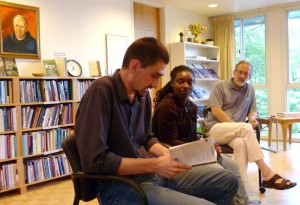 Writing workshop leader, Jonathan Wilson-Hartgrove, reads to the Writing to Change the World workshop participants.